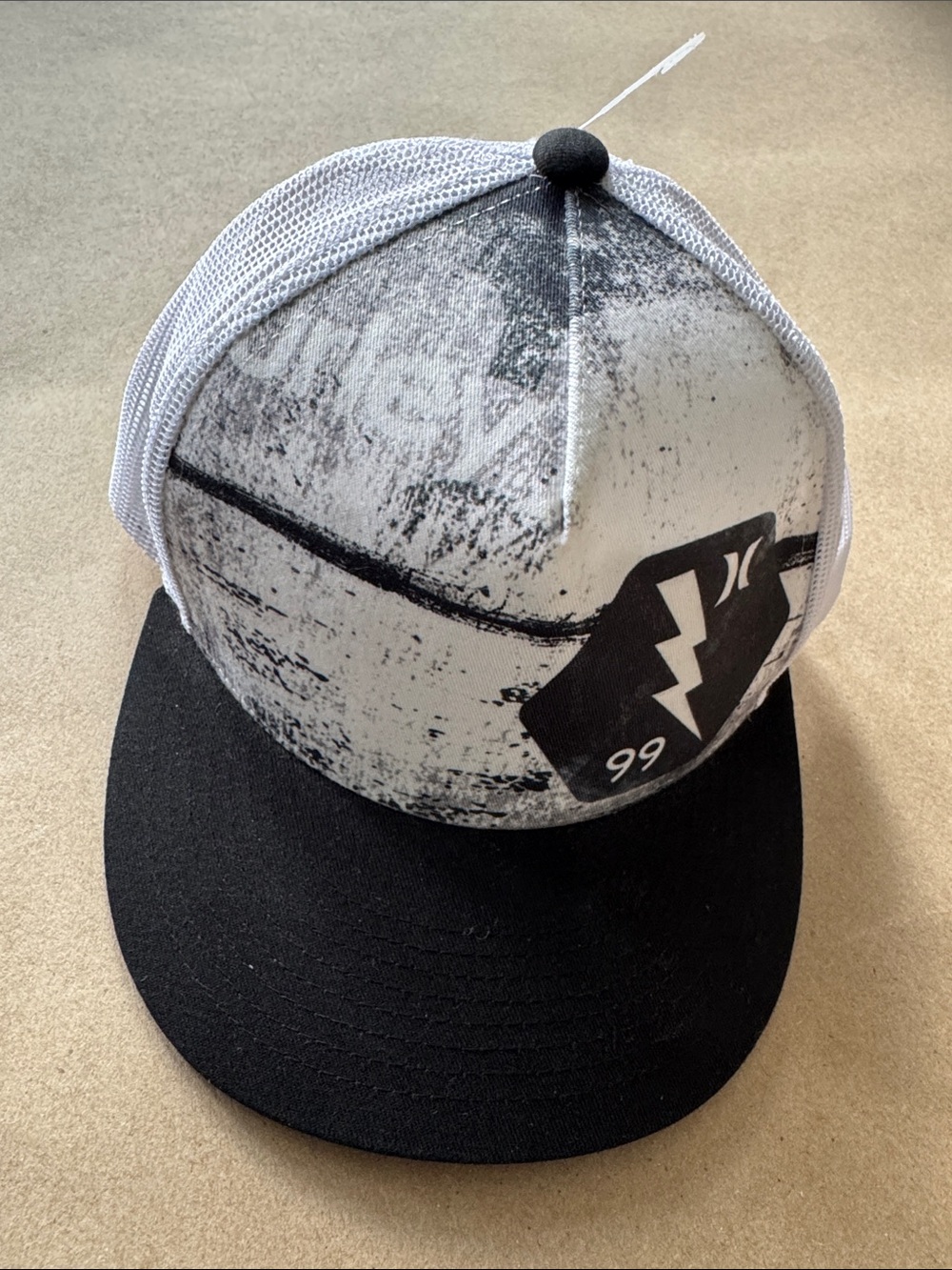 Hurley Black and White Trucker Hat with Lightning Patch
